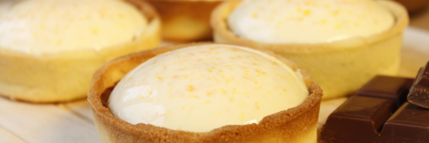 Tartelettes au chocolat et panna cotta à l'orange Tartelettes au chocolat et panna cotta à l'orange