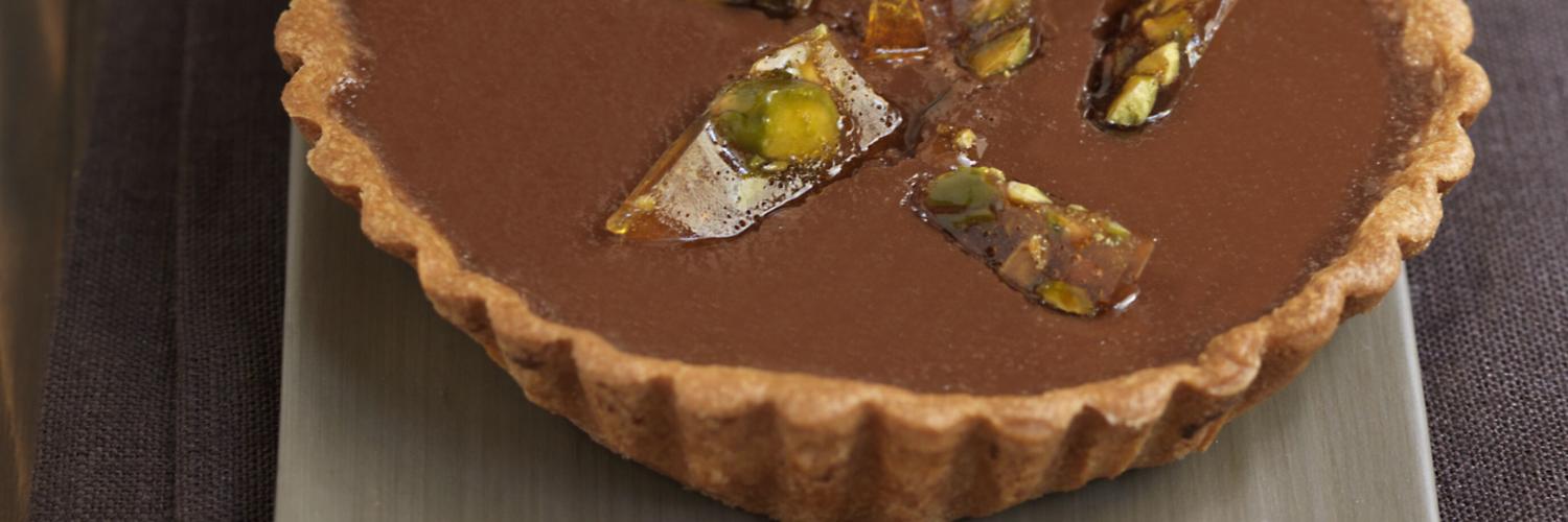 Tartelettes choco pralin et pistaches caramelisees Tartelettes choco pralin et pistaches caramelisees