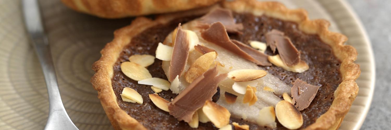 Tartelettes choco praline poires (pas avant octobre 2010) Tartelettes choco praline poires (pas avant octobre 2010)